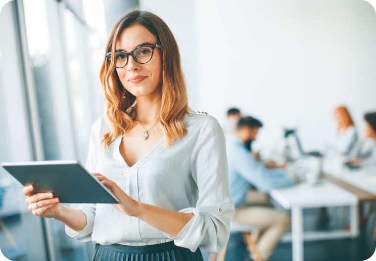 A woman holding a tablet